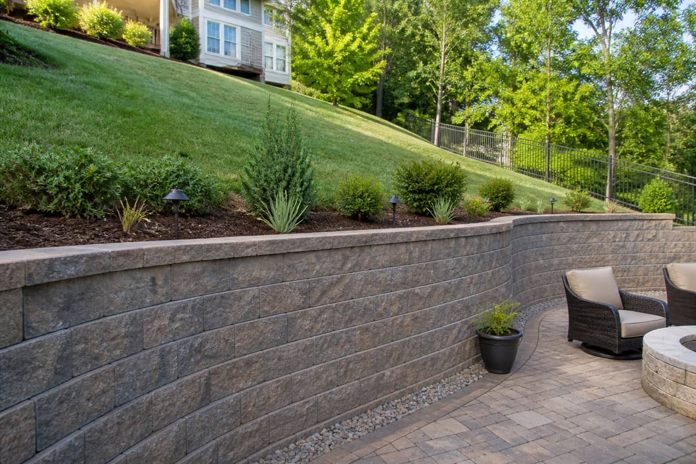 Stone stairs and retaining wall in a landscaped garden